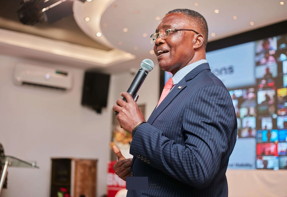 Nkem speaking at an event